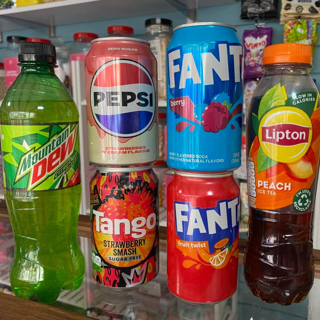A selection of colourful drinks including Pepsi, Fanta, and Mountain Dew.